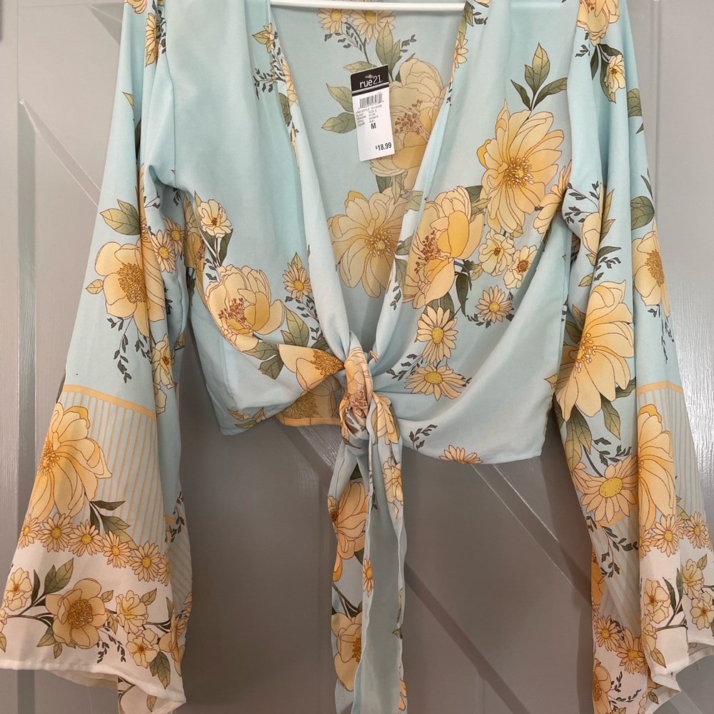 Rue 21, size M, does not stretch, very light and breathable material